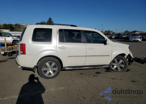 2013 Honda Pilot Touring z USA, uszkodzony, nr VIN 5FNYF4H95DB070466